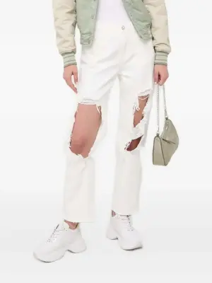 Джинсы с бахромой и искусственным жемчугом