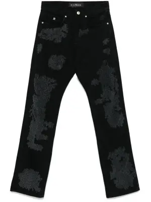 Джинсы с эффектом потертости