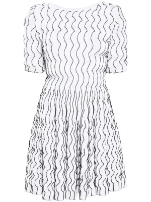 Расклешенное платье мини с оборками