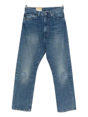 Джинсы с потёртыми коленями