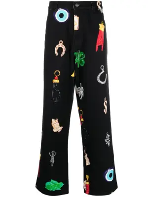 Джинсы с завышенной талией и графичным принтом