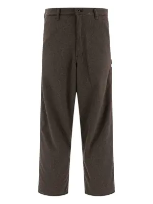 Брюки в ломаную клетку