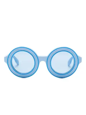 Солнцезащитные очки в круглой оправе