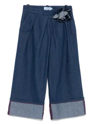 Джинсы с цветочной аппликацией