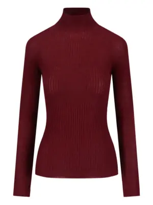 Вязаный свитер с высоким воротом