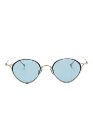 Солнцезащитные очки в круглой оправе