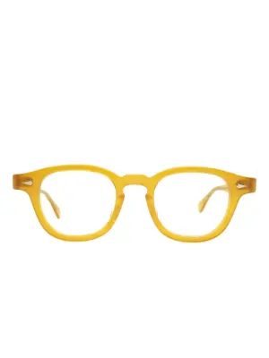 Солнцезащитные очки в круглой оправе