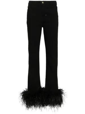 Джинсы с перьями