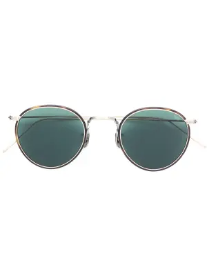 Солнцезащитные очки в круглой оправе