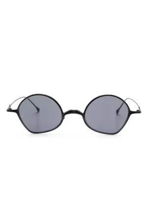 Солнцезащитные очки в геометричной оправе