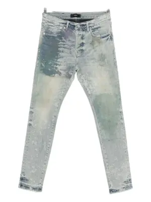 Джинсы с эффектом потертости