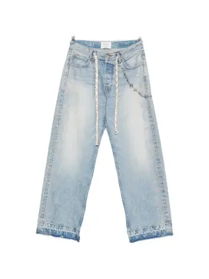 Джинсы с отделкой и бахромой