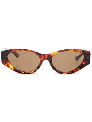 Солнцезащитные очки в овальной оправе