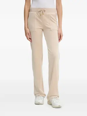 Велюровые спортивные брюки с накладными карманами