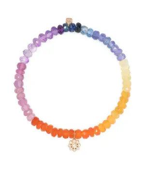 Браслет из бусин с подвеской из желтого золота