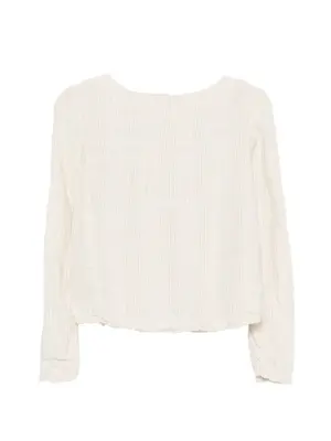 Блузка с узором и длинными рукавами