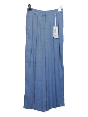 Льняные брюки со складками