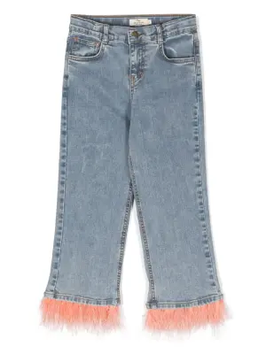 Джинсы из органического хлопка с бахромой