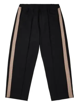 Брюки с полосками