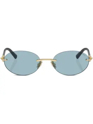 Солнцезащитные очки в овальной оправе