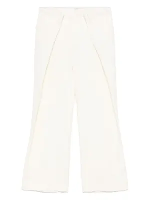 Широкие брюки со складками