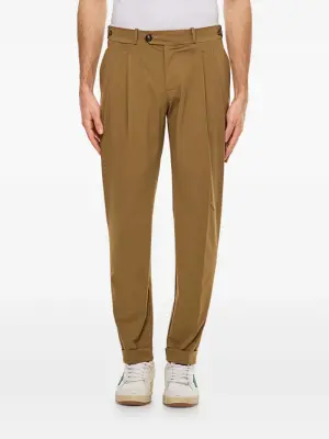 Брюки строгого кроя со складками