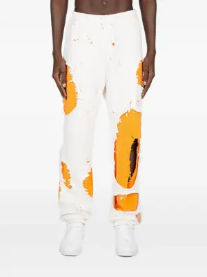 брюки с эффектом потертости