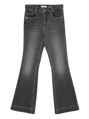 Джинсы-клёш с пятью карманами