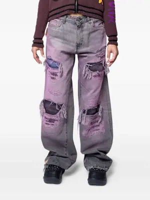 Джинсы с эффектом потертости