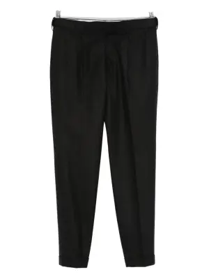 Брюки со складками на манжетах