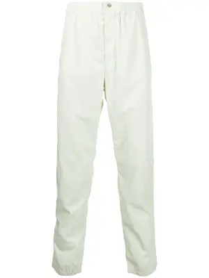 Брюки с эластичным поясом и карманами на молнии