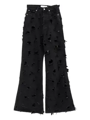 Джинсы с эффектом потертости