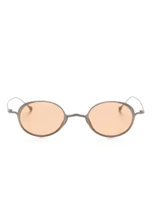 солнцезащитные очки в овальной оправе