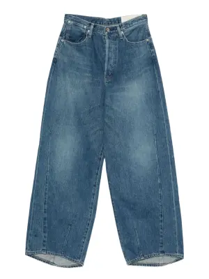 Джинсы с эффектом потертости