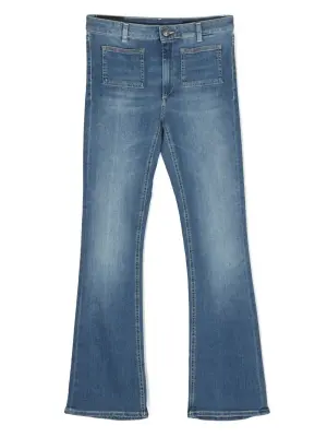 Джинсы с эффектом потертости