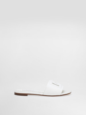 Плоские кожаные тапочки