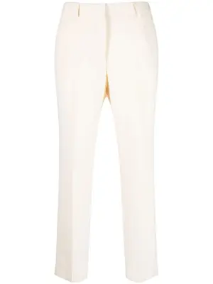 Зауженные брюки строгого кроя