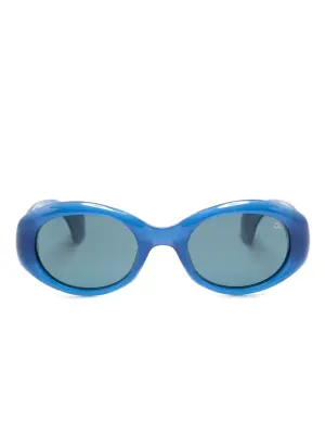 Солнцезащитные очки в овальной оправе
