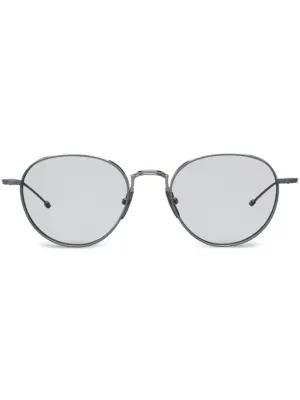 Солнцезащитные очки в круглой оправе