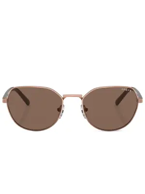 Солнцезащитные очки в круглой оправе