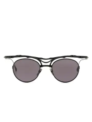 Солнцезащитные очки в круглой оправе