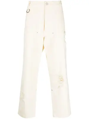 Джинсы свободного кроя с прорезями