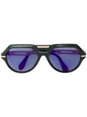 Солнцезащитные очки в крупной оправе с кожаной отделкой