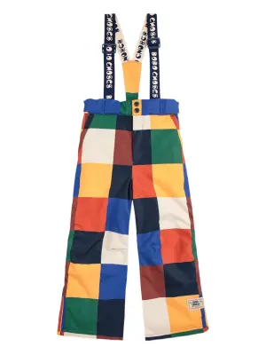 Брюки с лямками и отделкой в технике пэчворк