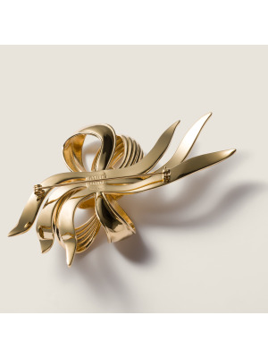 Металлическая брошь в виде банта