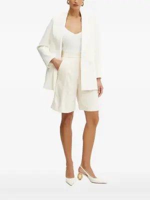 Двубортный пиджак на пуговицах