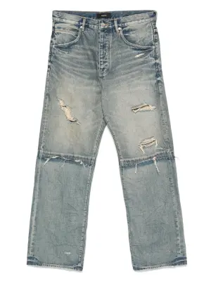 Широкие джинсы с эффектом потертости