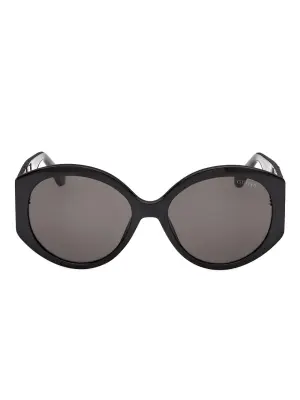 Солнцезащитные очки в круглой оправе