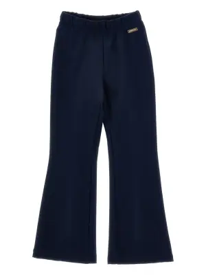 Расклешенные спортивные брюки