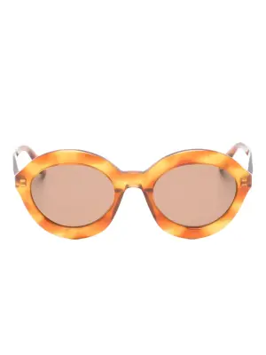 Солнцезащитные очки в круглой оправе